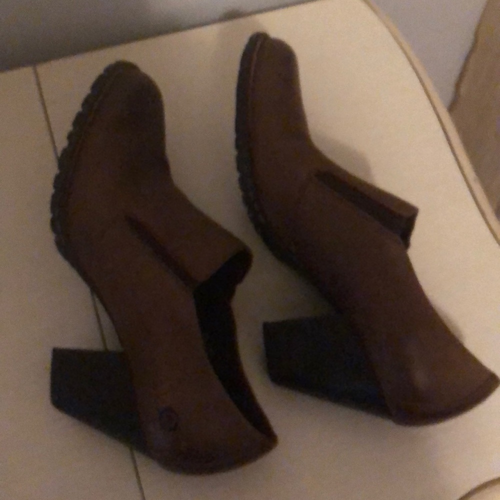 Had these awhile but never really worn them much. Few heel scratches. Comfy!